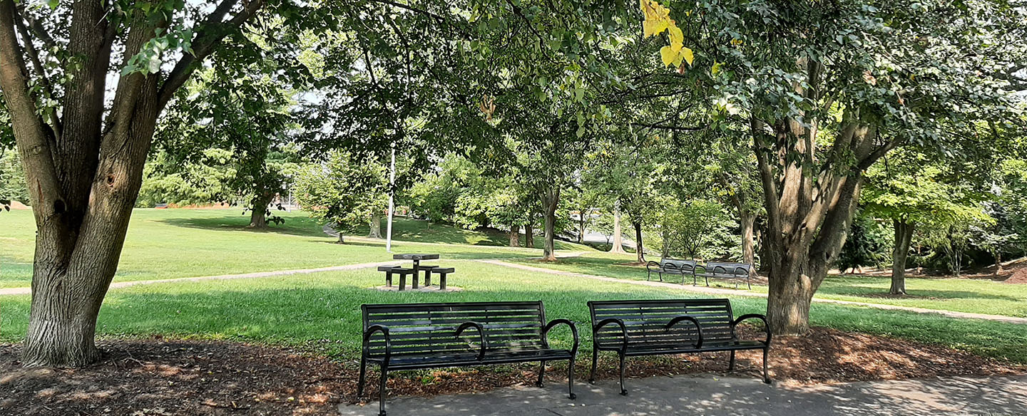 Paved Walking Path and Benches at Owl's Nest Park