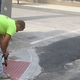 Installing detectable warning mat in a curb ramp at 12th & Race