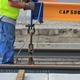 Rails will be adjusted and covered in a rubber sleeve. Then, the concrete will be poured.